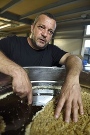 France, Corse du Sud, Prunelli river valley, Ocana, Le jardin des Abeilles (The garden of bees), the beekeeper Denis Casalta present his honey