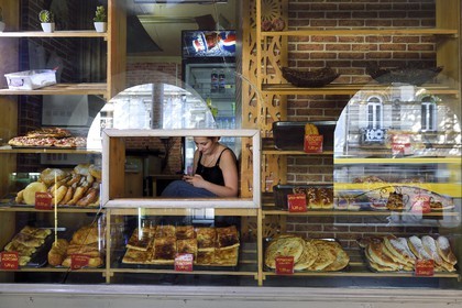 Georgia, Tbilisi, Merab Kostava street, khachapuri saleswoman