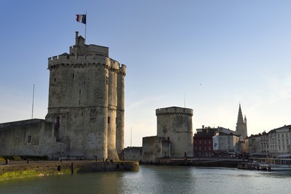 France, Charente-Maritime, La Rochelle, the Old Port, Tour Saint Nicolas and Tour de la Chaine protect the entrance to the Old Port, the tour de la Lanterne in the background