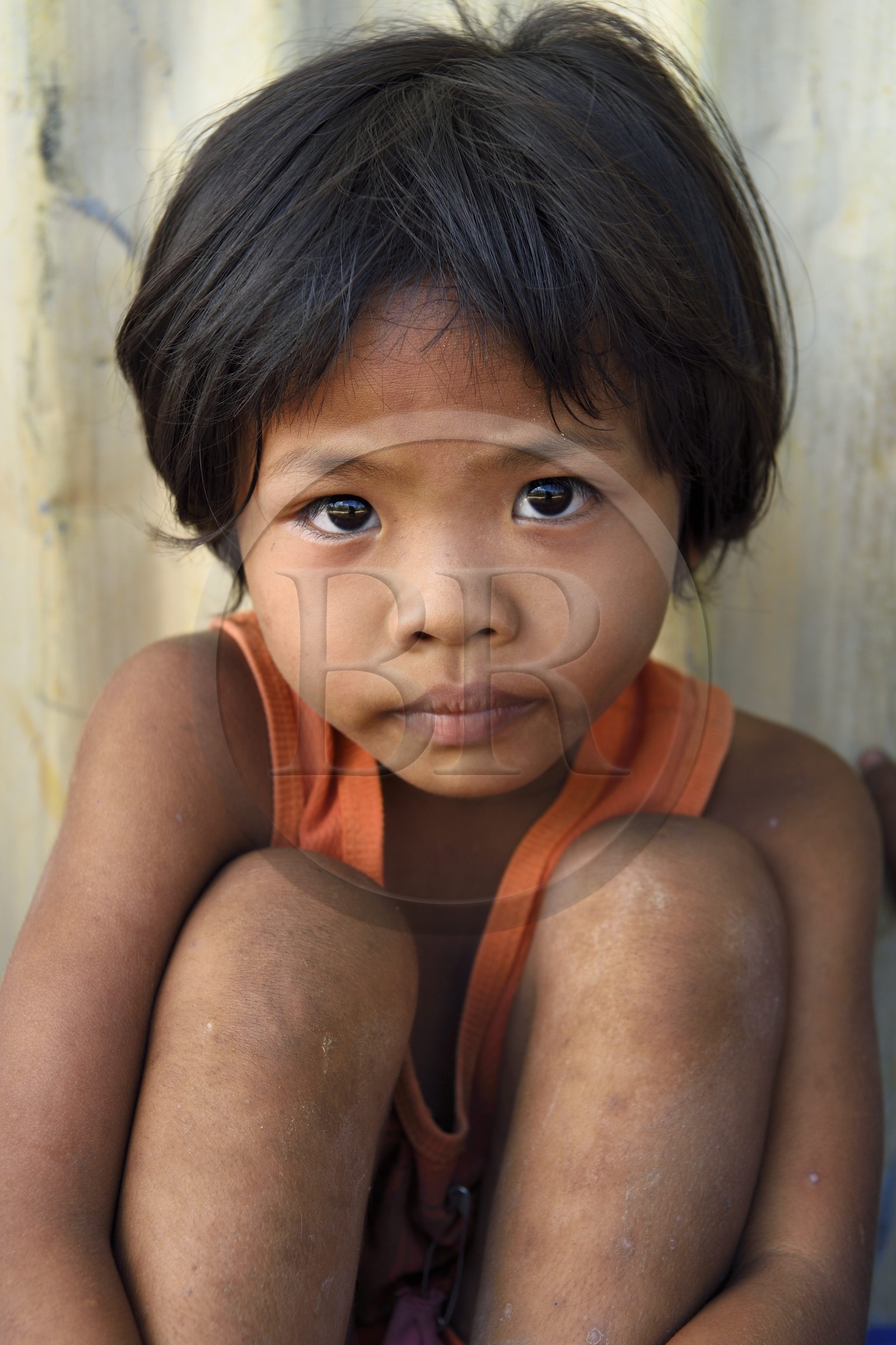 Philippines, Calamian Islands dans le nord de Palawan, Uson Island dans la baie de Coron, enfant du village de Barangay Lajala