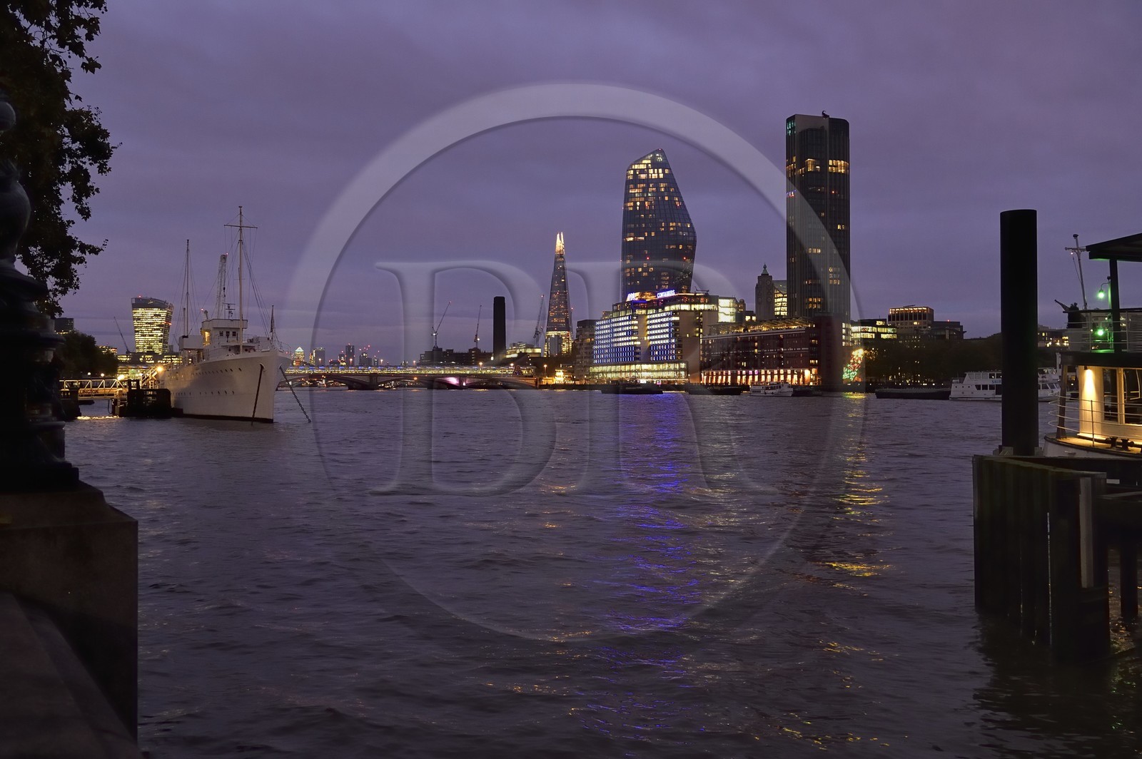 United Kingdom, London, HQS Wellington on Victoria embankment, the skyscrapers Shard and One Blackfriars in the background