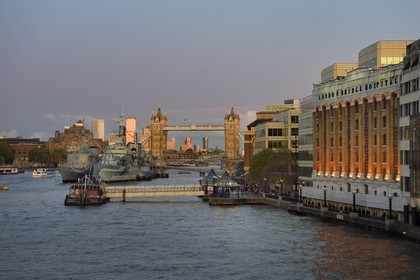 United Kingdom, London, the warship HMS Belfast on the edge of the Southwark district and the Tower Bridge swinging bridge across the Thames