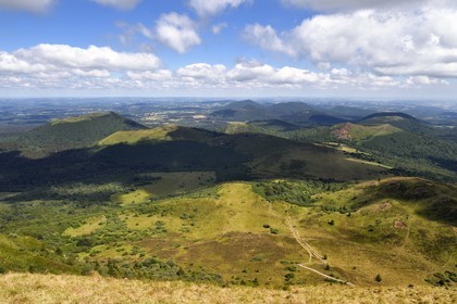 France, Puy de Dome, Parc Naturel Régional des Volcans d'Auvergne (regional nature park of Auvergne volcanoes), the northern part of the Chaine des Puys listed as World heritage by UNESCO, the path leading to the Traversin and the Puy Pariou crater on the right, in the background on the left the Puy de Côme
