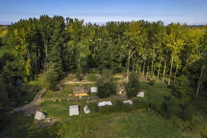 France, Calvados, Herouville Saint Clair, Domaine de Beauregard, Ornavik Historical Park, reconstitution of a Viking encampment of the year 1000, space composed of tents that the Vikings took with them on an expedition (aerial view)
