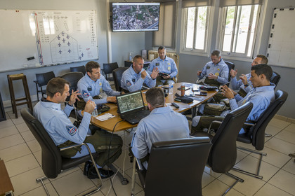 France, Bouches du Rhone, Salon de Provence, air base 701, base of the Patrouille de France (PAF for Patrouille acrobatique de France) of the French Air and Space Force, the music rehearsal, mental visualization of the flight, under the direction of commander and leader Julien Decorte (left) during the briefing in the premises of the Patrouille de France