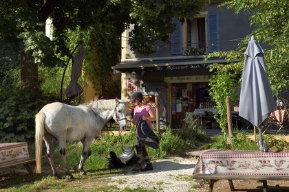 France, Dordogne, Perigord Noir, Vezere Valley, Saint Leon sur Vezere, labelled Les Plus Beaux Villages de France (The Most Beautiful Villages of France), a rider and her horse
