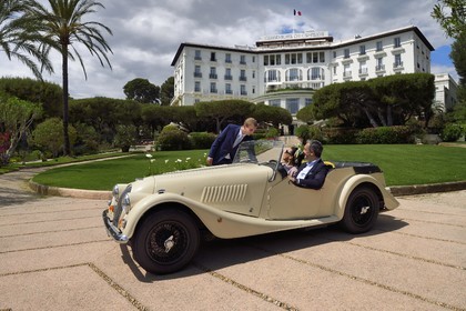 France, Alpes Maritimes, Saint Jean Cap Ferrat, Grand-Hotel du Cap Ferrat, a 5 star palace from Four Seasons Hotel, the doorman welcomes customers in a Morgan Roadster 4 4