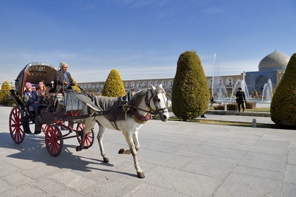 Iran, Isfahan Province, Isfahan, carriage on naghsh-i jahan square also known as Imam Khomeiny square, listed as World Heritage by UNESCO, the Sheikh Lotfollah Mosque