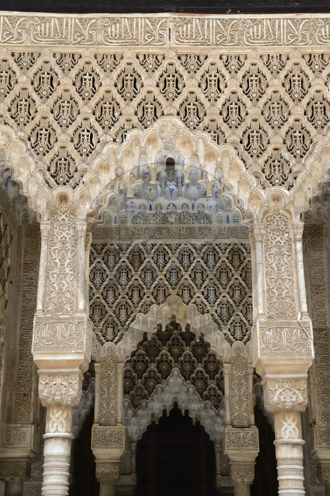 Spain, Andalusia, Granada, Alhambra Nasrid Palace, listed as World Heritage by UNESCO, columns of the Palace of the Lions patio (Patio de los Leones)