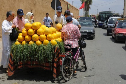Morocco, Oriental Region, Oujda, selling vegetables along the walls of the medina