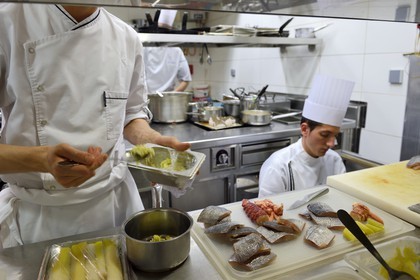 France, Rhone, Lyon, restaurant La Mère Brazier founded in 1921 by Eugenie Brazier, the Mathieu Viannay two Michelin stars Chef kitchen brigade on work