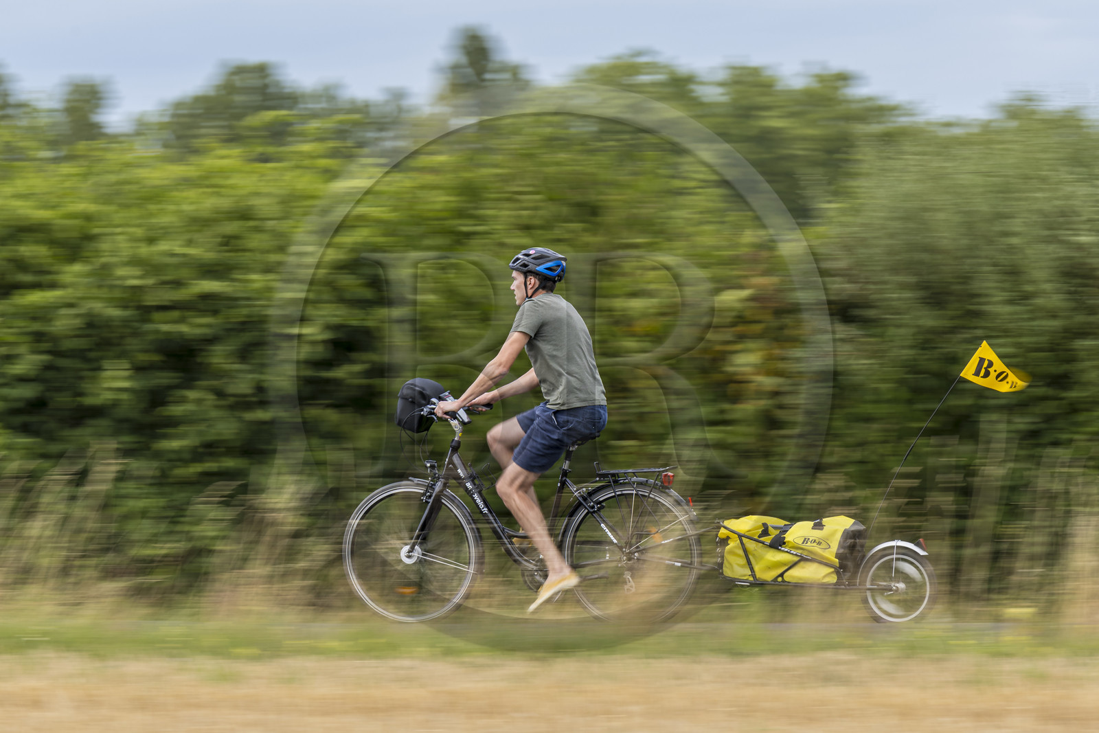 France, Maine-et-Loire, Loire valley listed as World Heritage by UNESCO, Saumur towards Saint-Hilaire, bicycle journey with a trailer carrying camping equipment
