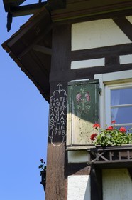 Germany, Baden-Wurttemberg, Durbach, half timbered farm, decorated pane